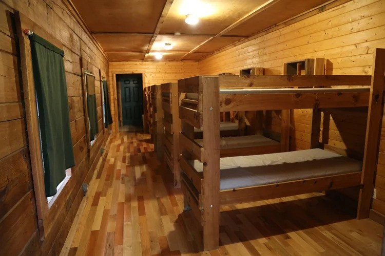 Spacious cabin interior with multiple beds